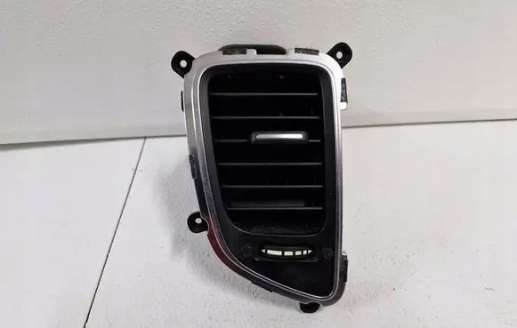 KIA Carens III Dash center air vent grill