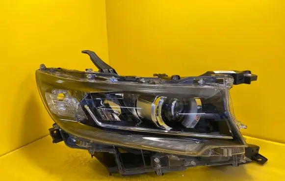 Toyota Land Cruiser (J150) Headlight/headlamp 85661-28011