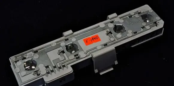 Tail light bulb cover holder