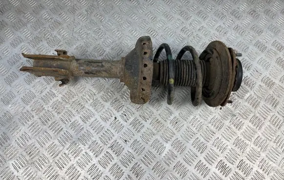 Subaru Outback Front shock absorber with coil spring