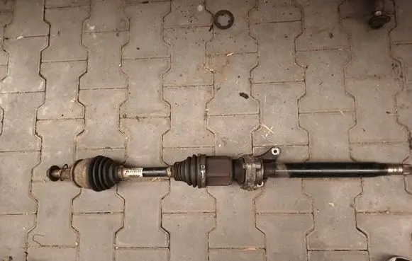 Opel Astra J Front driveshaft 13335125