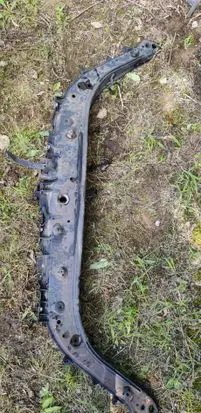 Top upper radiator support slam panel