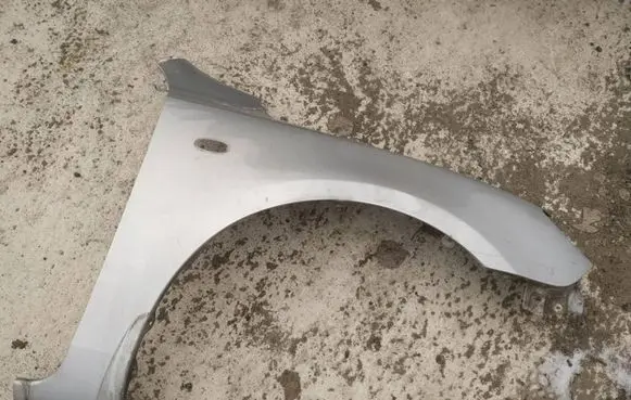 Mazda 3 I Fender pilkas