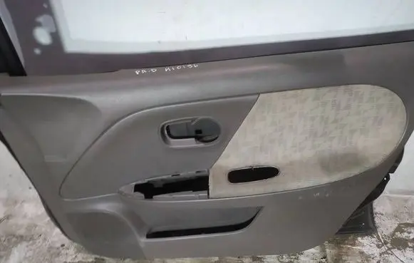 Nissan Note (E11) Front door card panel trim