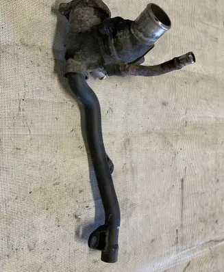 Thermostat/thermostat housing