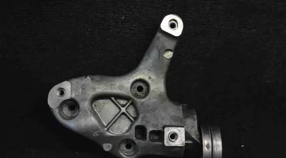 Volkswagen Golf VI A/C compressor mount bracket 1K0260885B