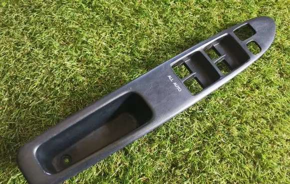 Toyota Avensis Verso Front door window switch trim 74232-44130