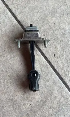 Subaru Legacy Front door check strap stopper 61124AG001