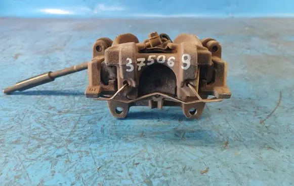 Ford Escape III Front brake caliper DG9Z2553C