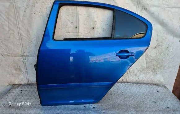 Skoda Octavia Mk2 (1Z) Rear door