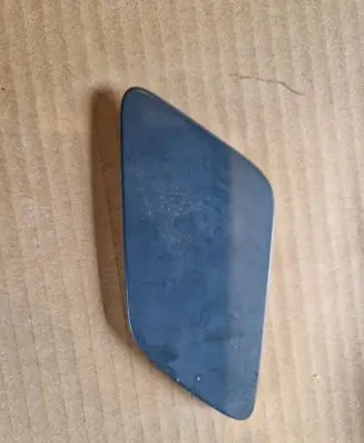 Headlight washer spray nozzle cap/cover