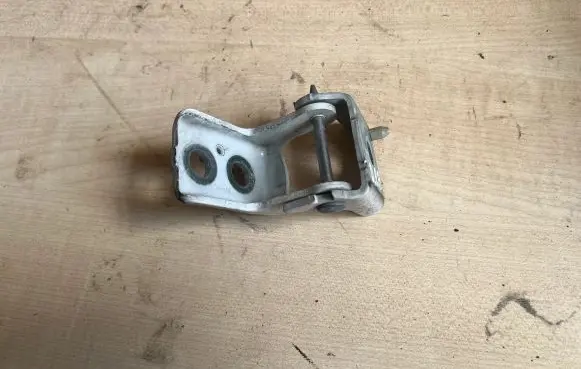 Front door lower hinge
