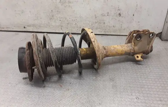 Subaru Legacy Front shock absorber with coil spring