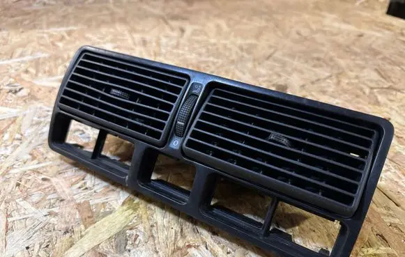 Volkswagen Golf IV Dash center air vent grill 1J0819728C