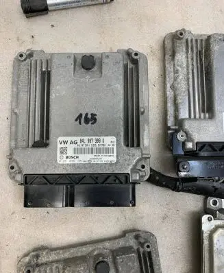 Volkswagen Tiguan Engine control unit/module 04L907309K 0281030170