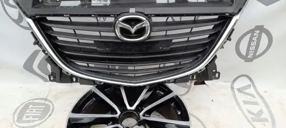 Mazda 3 II Front bumper upper radiator grill BJS750712