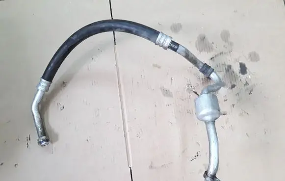 KIA Carens II Air conditioning (A/C) pipe/hose UND20