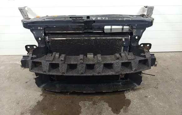 Radiator support slam panel