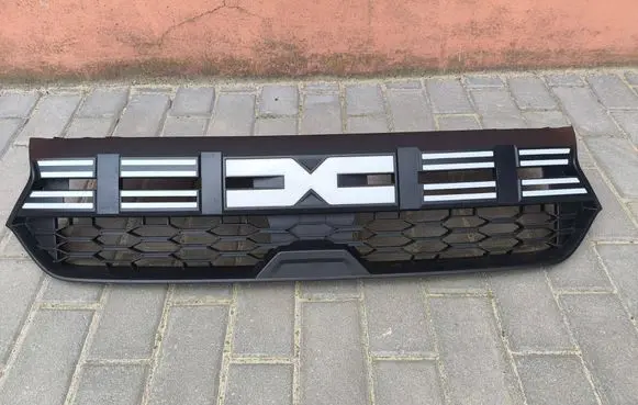 Dacia Sandero III Front bumper upper radiator grill