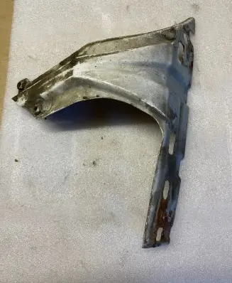 Volkswagen Caddy Fender mounting bracket 1T0821136