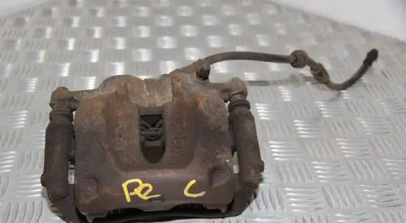 Opel Vivaro Front brake caliper 7701050919