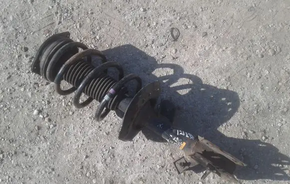 Nissan Qashqai+2 Front shock absorber with coil spring