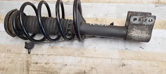 Citroen C4 I Front shock absorber with coil spring