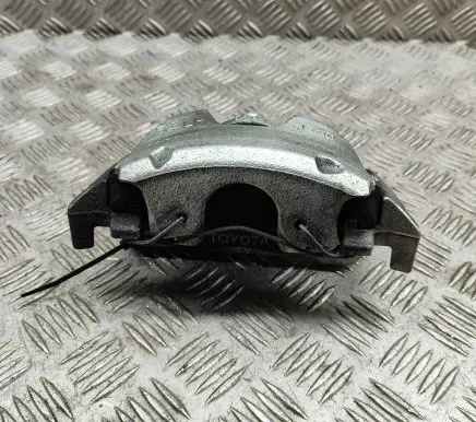 Toyota Yaris XP210 Front brake caliper 47750K0030