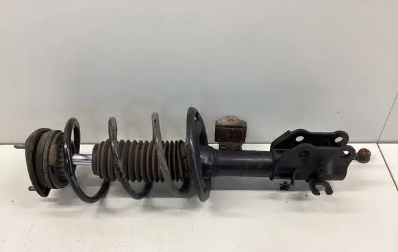 Mazda 3 III Front shock absorber with coil spring AVA5138J53