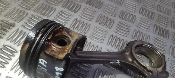 Piston with connecting rod