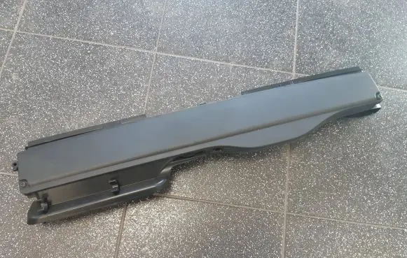 Engine bonnet/hood lock trim molding