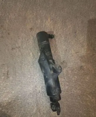 Headlight washer spray nozzle