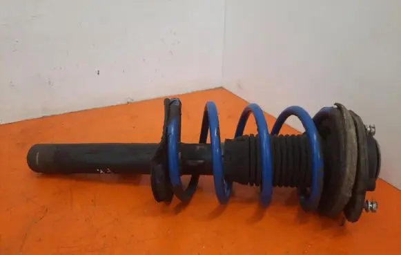 Peugeot Partner Front shock absorber with coil spring