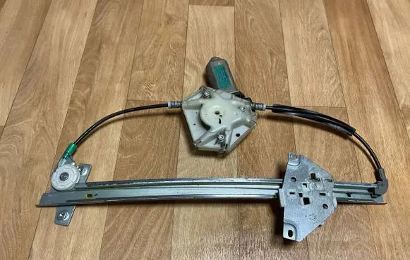 Volvo S40, V40 Front door window regulator with motor 113136102 FR1160094