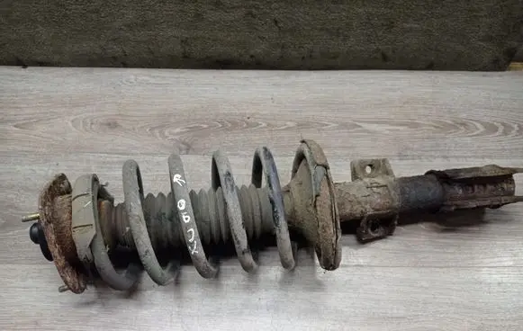 Volvo XC90 Front shock absorber with coil spring