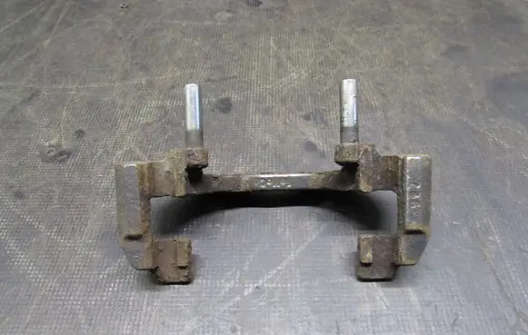 Mazda 3 I Front Brake Caliper Pad/Carrier 