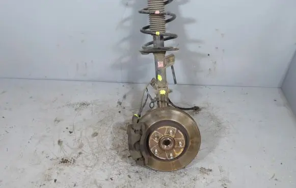 Nissan X-Trail T31 Front shock absorber with coil spring