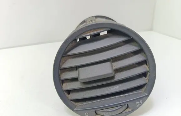 Volkswagen Caddy Dash center air vent grill 2K0819703B