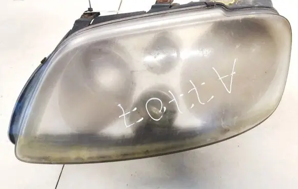 Volkswagen Touran I Headlight/headlamp 1t0941005d