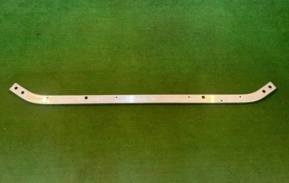 Top upper radiator support slam panel