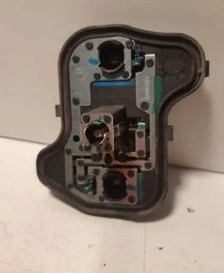 Tail light bulb cover holder
