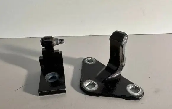 Front door lower hinge