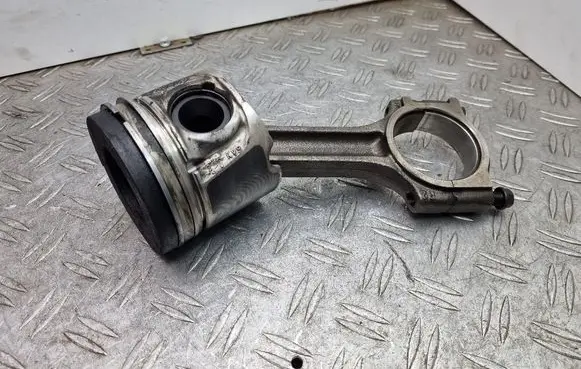 Piston with connecting rod
