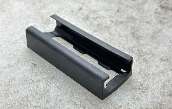 Tesla Model 3 Front driver seat rail trim 156657300A