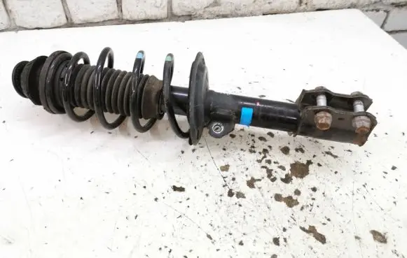 Toyota Yaris Front shock absorber with coil spring 485200D300 4380100500