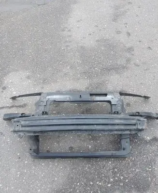 Radiator support slam panel
