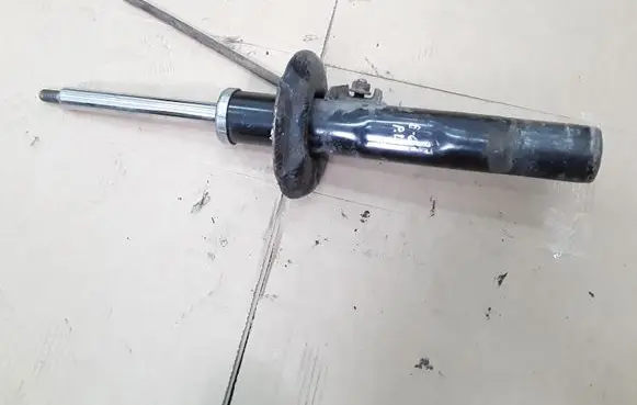 Volkswagen PASSAT B6 Front shock absorber/damper 335808