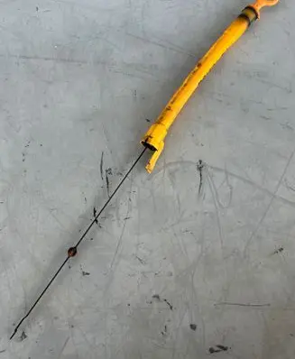Oil level dip stick