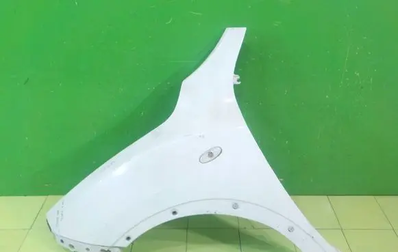 Nissan Juke I F15 Fender PRZOD LEWY