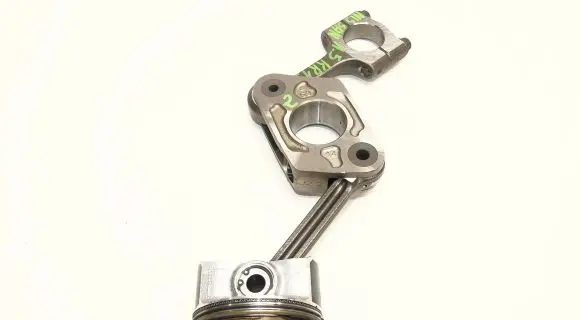 Piston with connecting rod